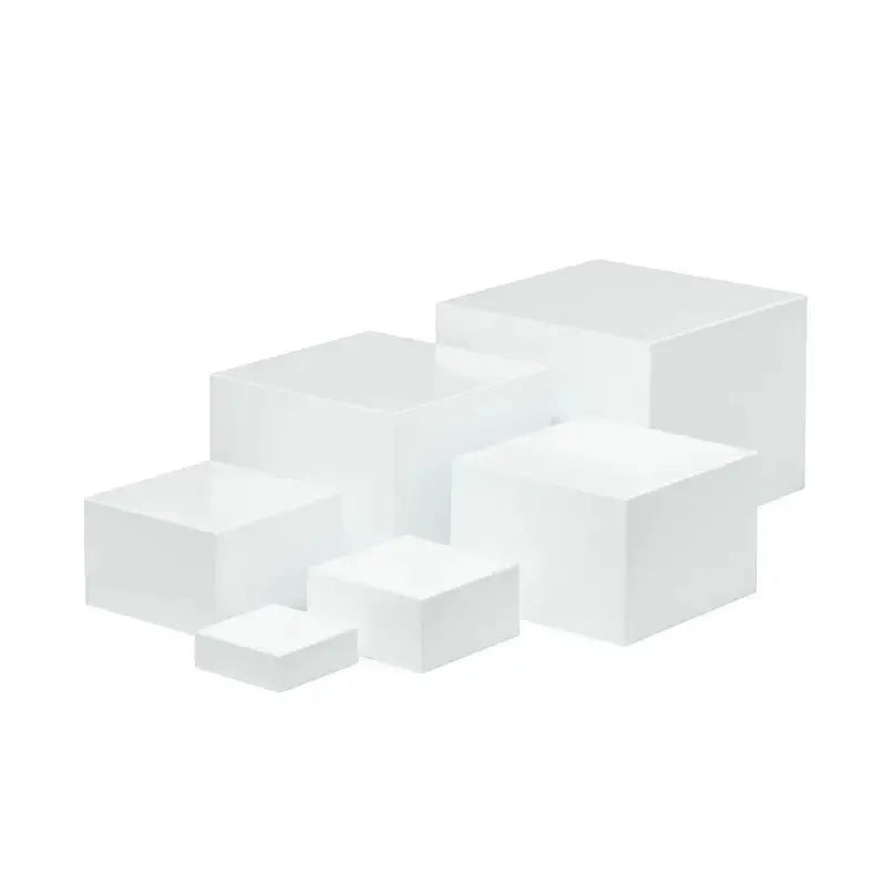White plastic six-piece suit cube desktop dessert display stand set arranged in tiers.
