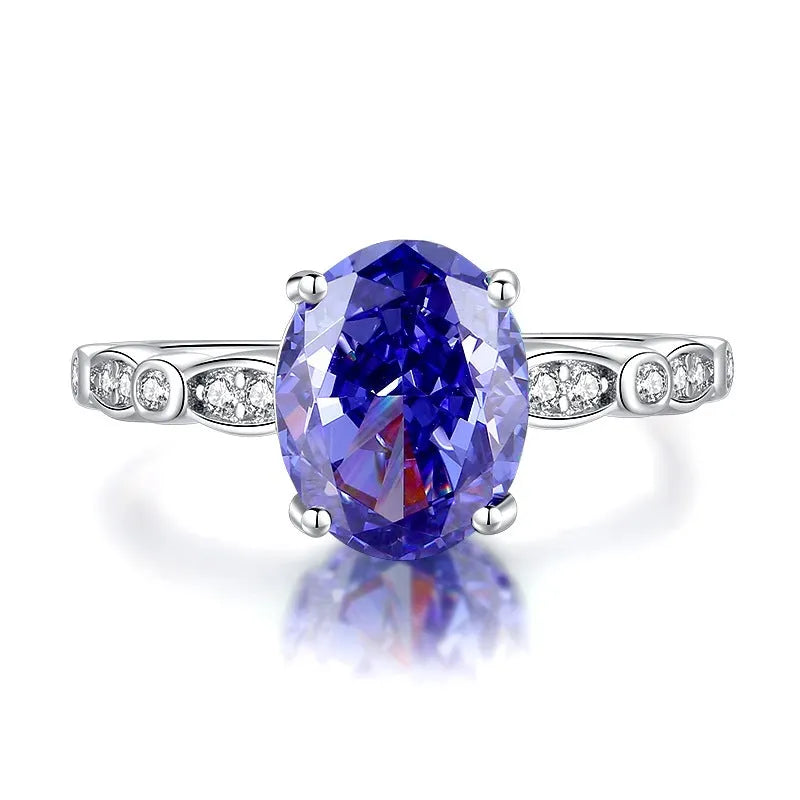 Heart-shaped high carbon diamond ice flower cut colour zircon stone set in a women's 925 sterling silver ring.
