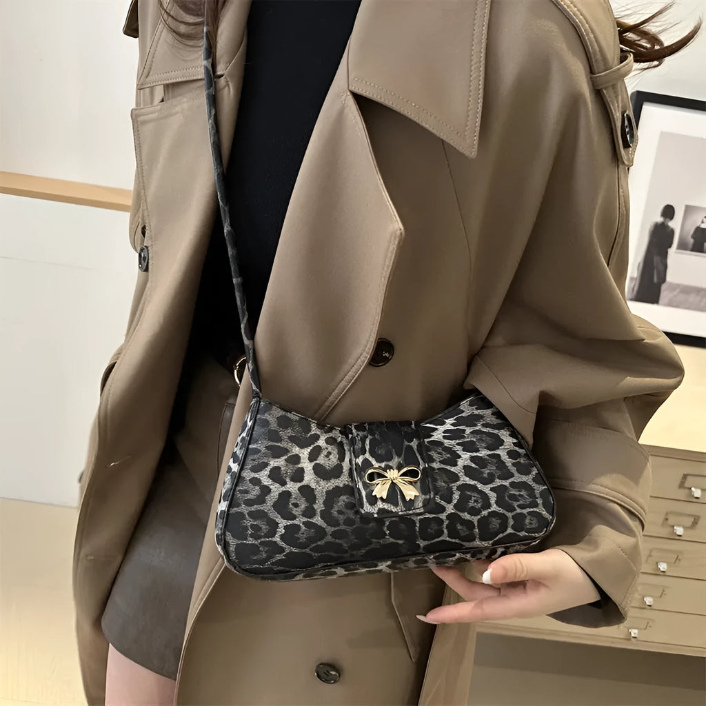 Large casual PU handbag for women in black, shown with sandwich pocket detail.