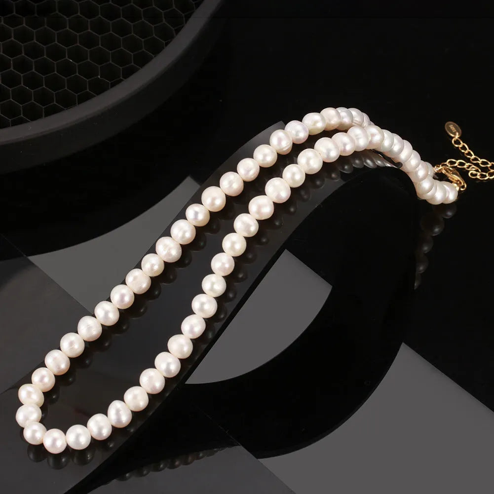 Adjustable sterling silver necklace with natural freshwater pearl pendant