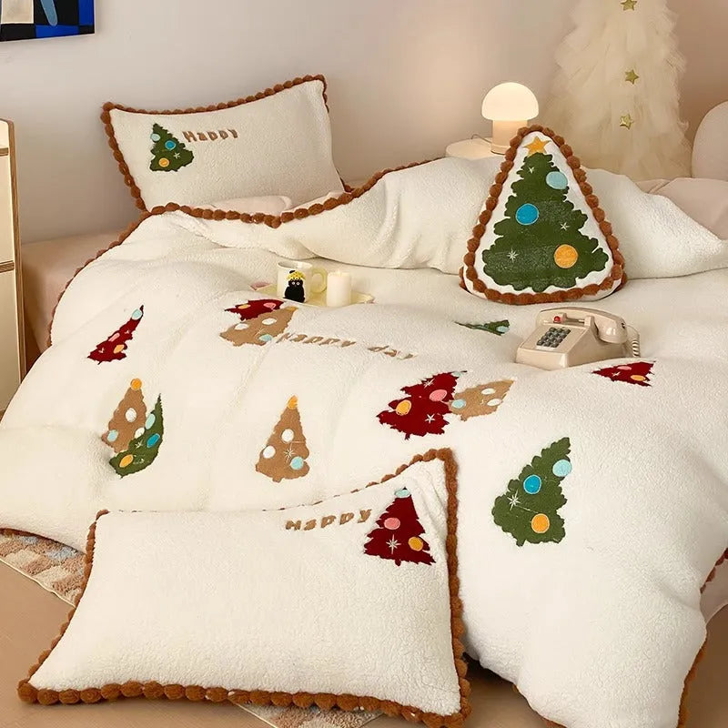 Bright yellow fleece-lined bedding set with embroidered cartoon Christmas tree pattern, including duvet cover, sheet, and pillowcases.