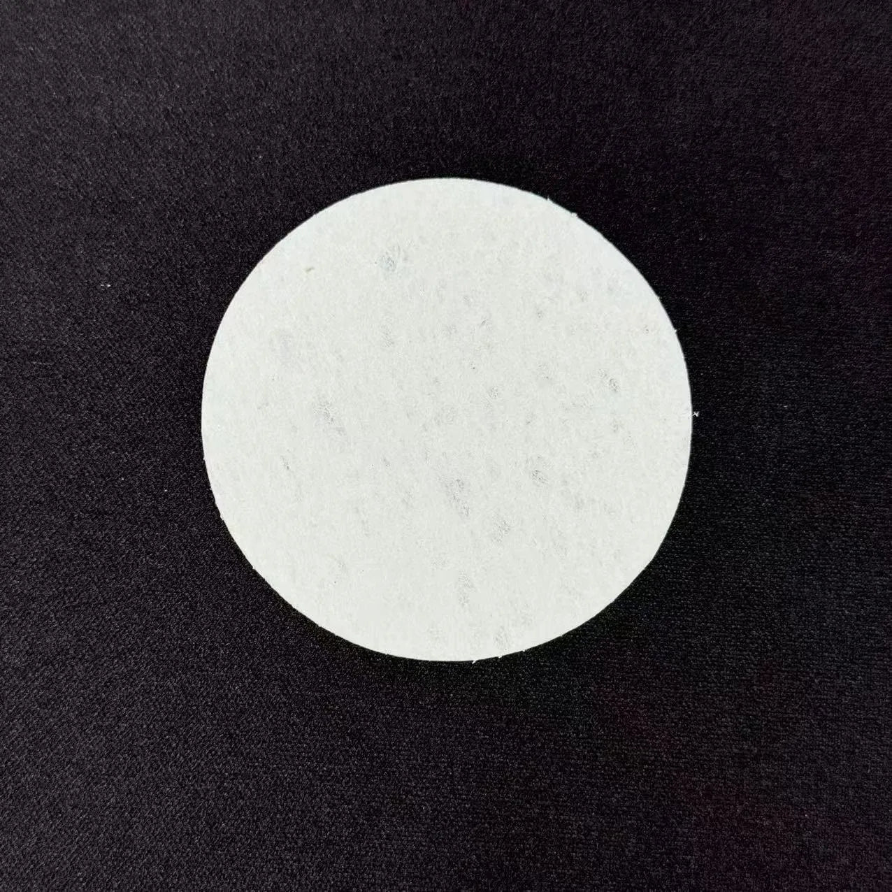 Painting sponge set showing heart, round, and square cellulose sponges with a stack of wood pulp paper for watercolour art.