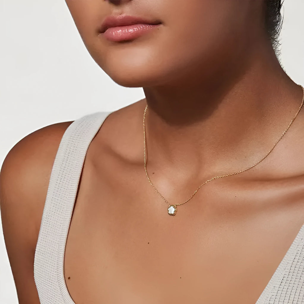 White mother-of-pearl shell flower pendant necklace with O-shaped chain in gold or silver finish