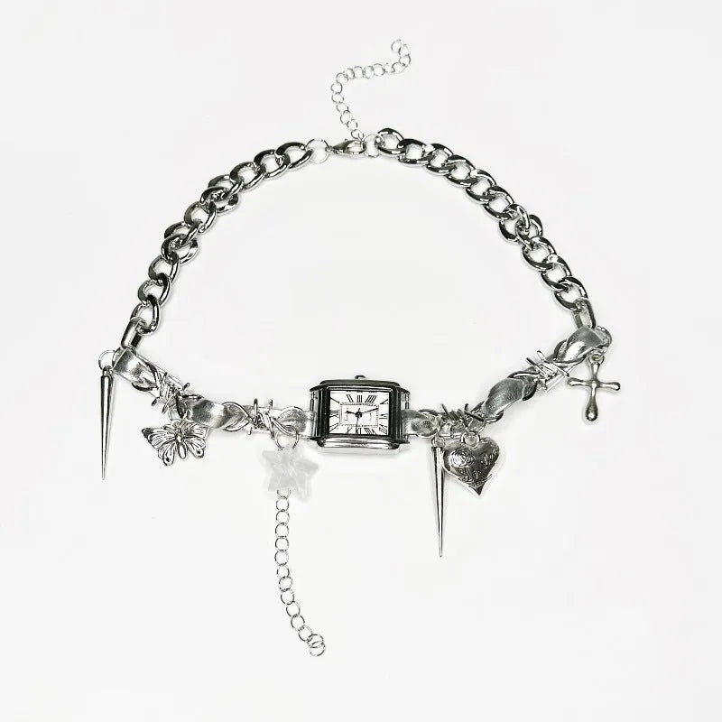 Dark multi-layer necklace with hemp flower chain links and a cross pendant on an adjustable 41-50cm chain.