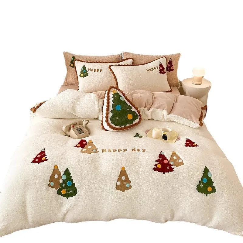 Bright yellow fleece-lined bedding set with embroidered cartoon Christmas tree pattern, including duvet cover, sheet, and pillowcases.