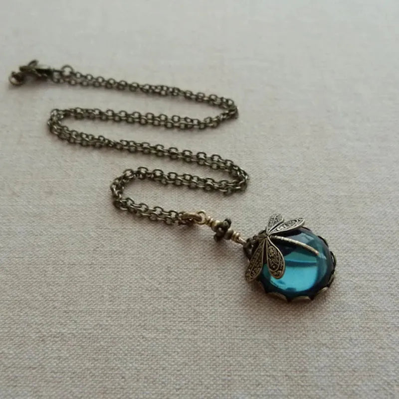 Hand carved dragonfly pendant necklace in vintage bronze finish on sterling silver chain