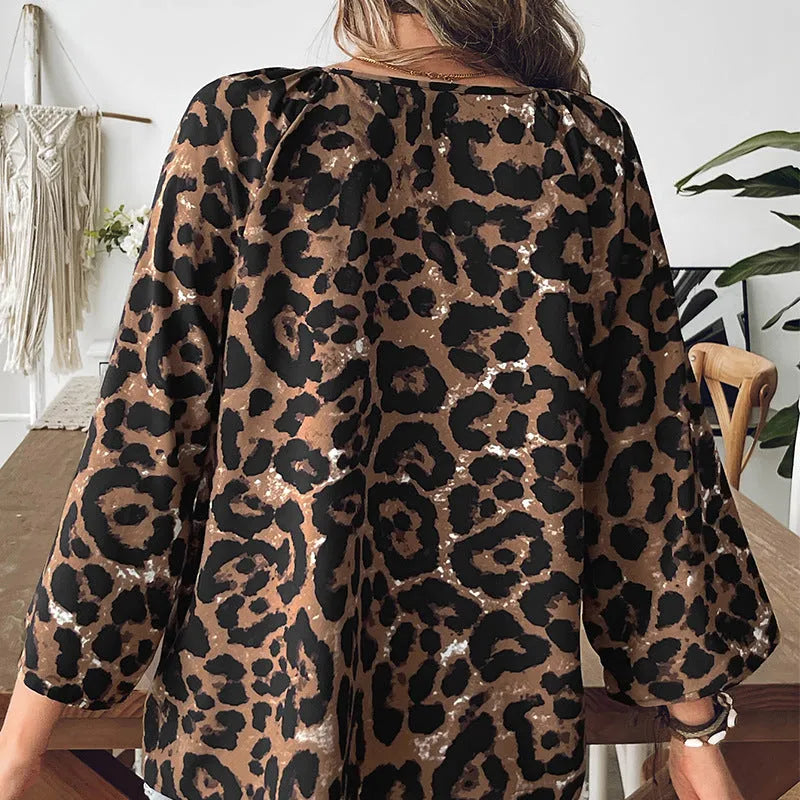Women's leopard print polyester pullover top with V-neck and half sleeves in multicolour pattern