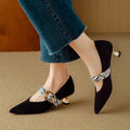 Women's black French pointed toe high heel shoes with stiletto heel and ankle buckle closure