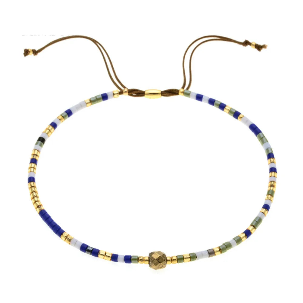 A colourful Bohemian style beaded bracelet with semi-precious stone and glass beads on an adjustable strap.
