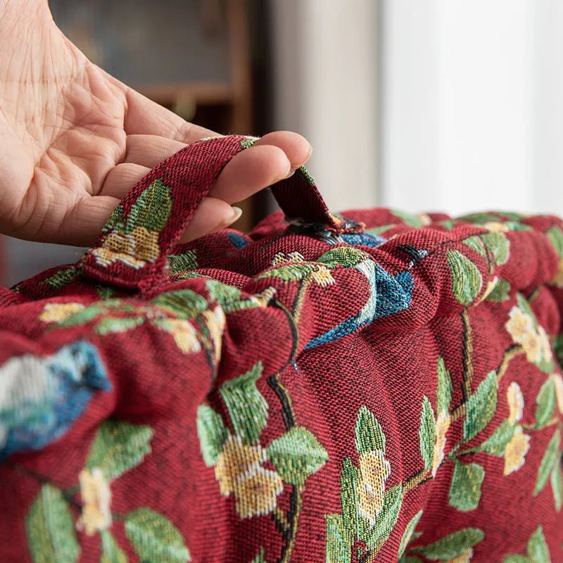 American-style square dining chair cushion for back support in apricot floral pattern.