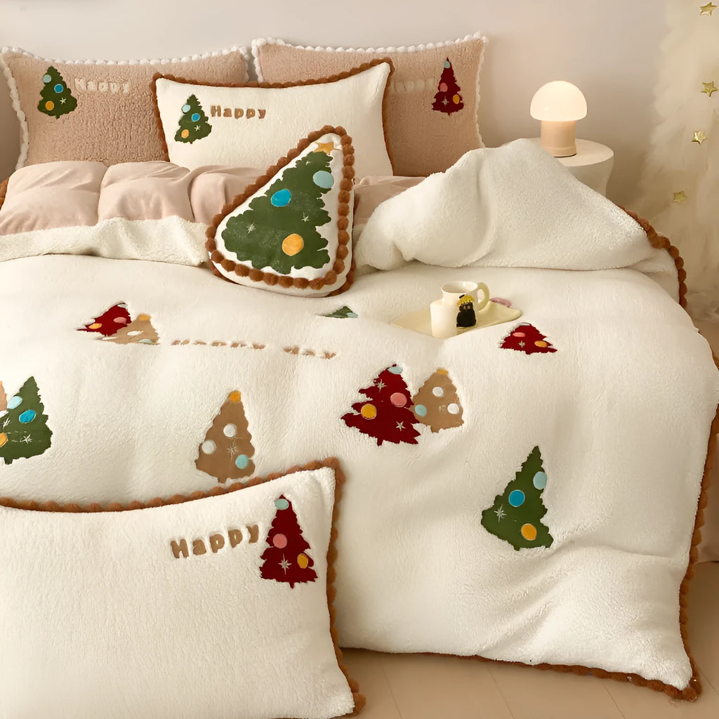 Bright yellow fleece-lined bedding set with embroidered cartoon Christmas tree pattern, including duvet cover, sheet, and pillowcases.