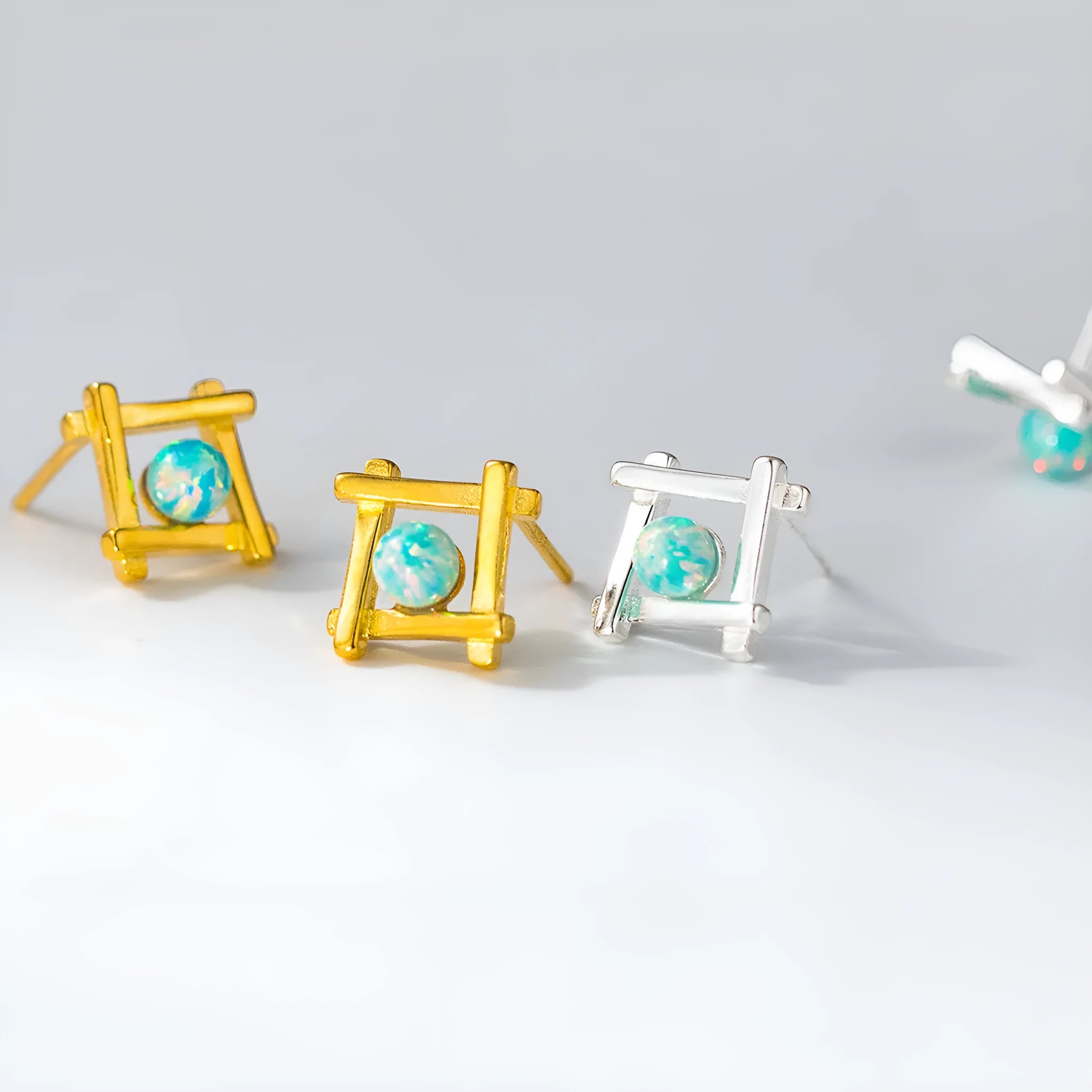 Geometric cross quadrangle stud earrings in sterling silver with gold or silver plating