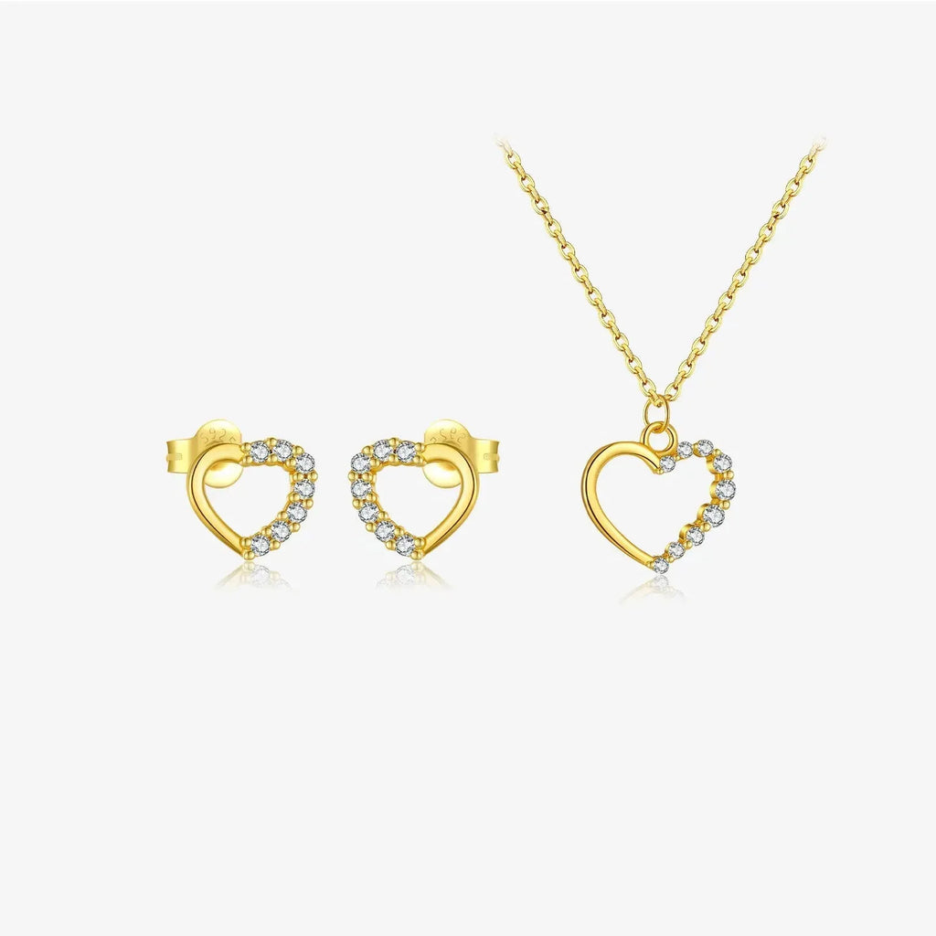 Sterling silver hollow heart necklace with circular details on a regular chain