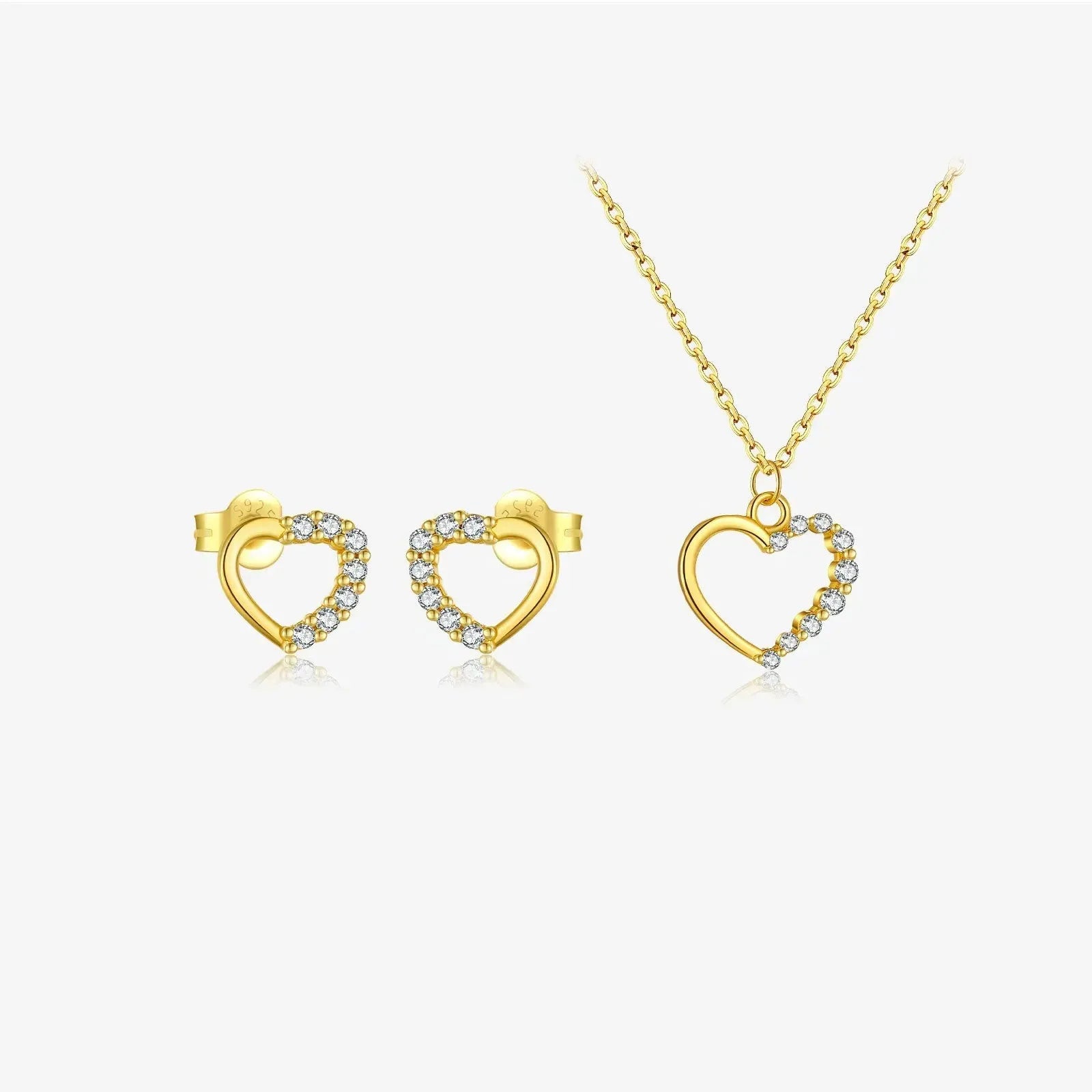 Sterling silver hollow heart necklace with circular details on a regular chain
