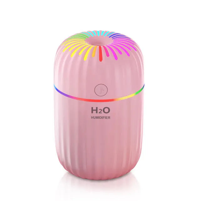 Small green animal-shaped USB humidifier for car and desktop use.