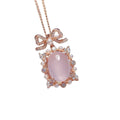 Geometric rose quartz pendant necklace on a silver chain with rose gold plating