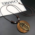 Wooden leaf ethnic necklace with electroplated alloy finish on adjustable wax line chain