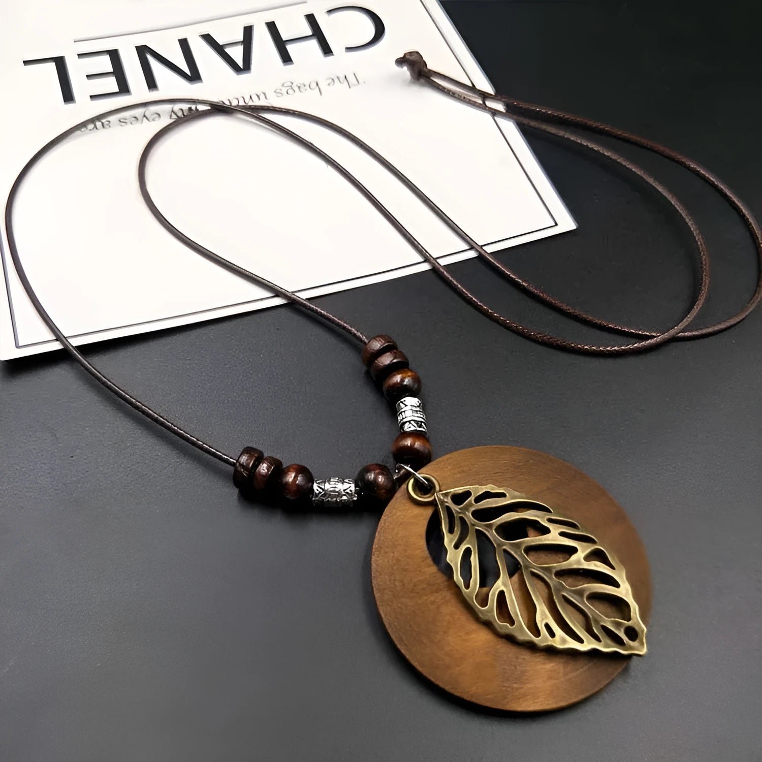 Wooden leaf ethnic necklace with electroplated alloy finish on adjustable wax line chain