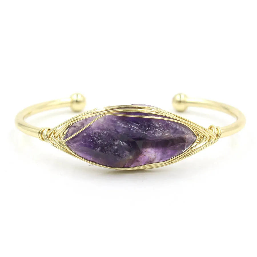 Natural raw gemstone bracelet with 8mm amorphous crystal beads on an adjustable open band.