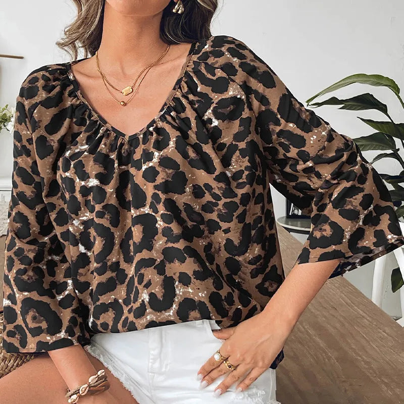 Women's leopard print polyester pullover top with V-neck and half sleeves in multicolour pattern