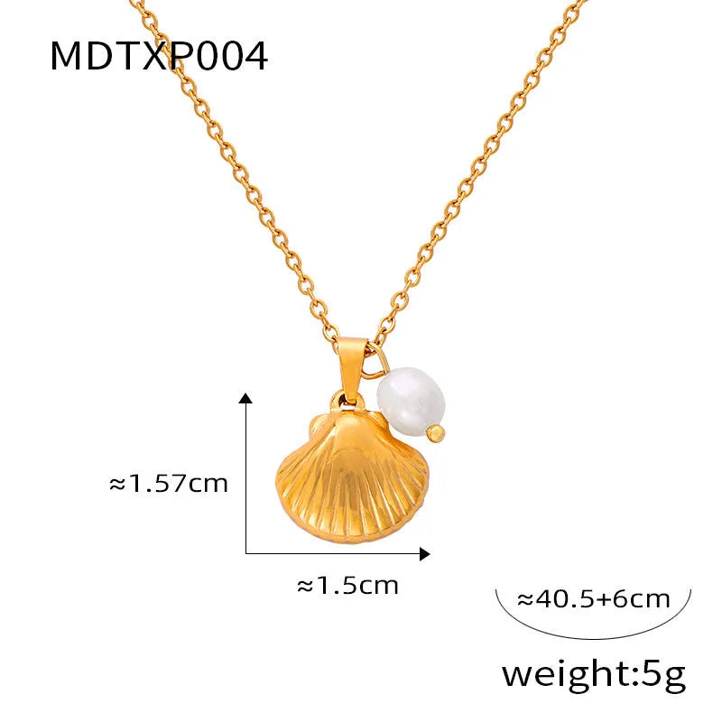 Gold tone women's necklace with shell pendant and freshwater pearl bead on O-chain.