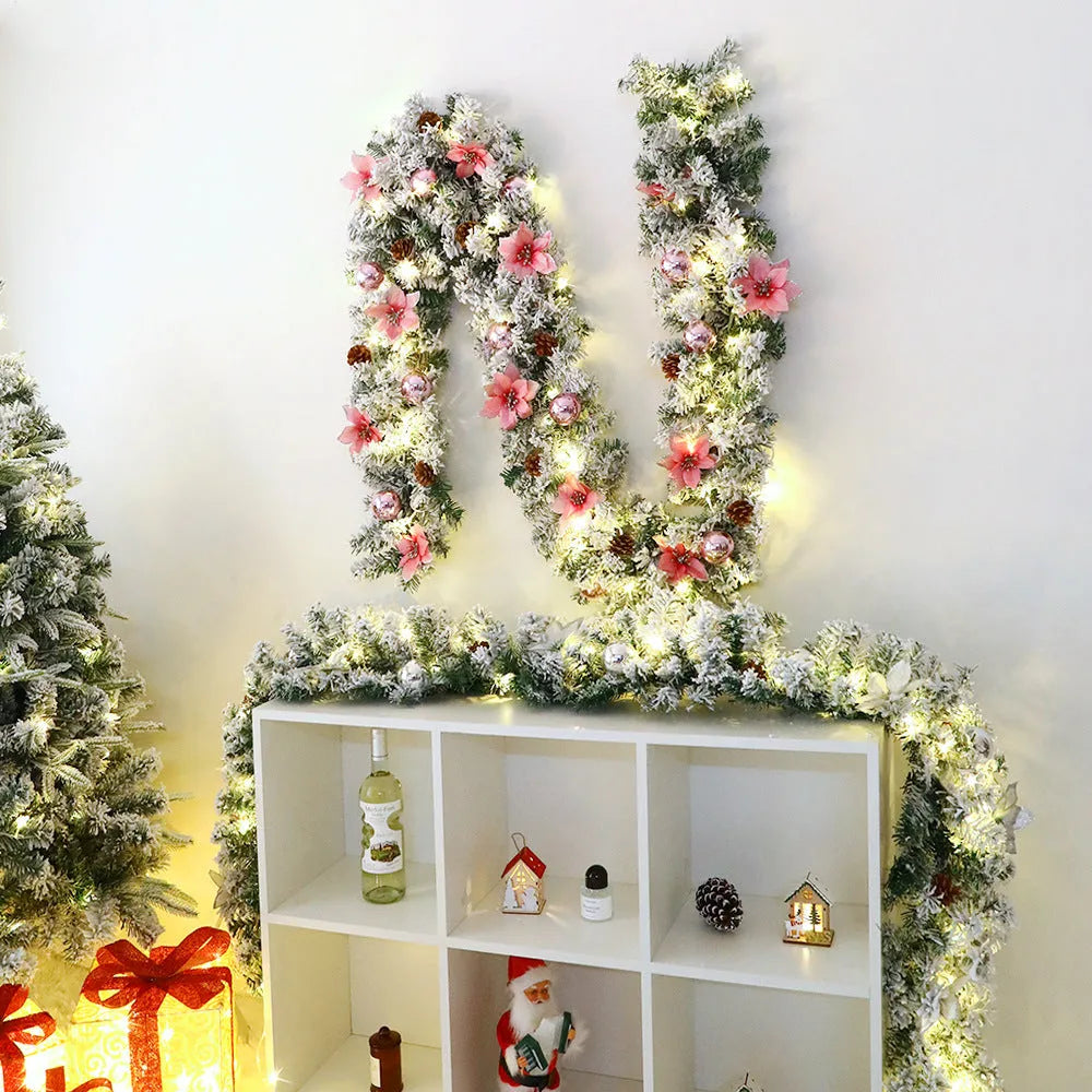 PVC rattan Christmas garland with flocked decoration in golden colour, draped along a mantle