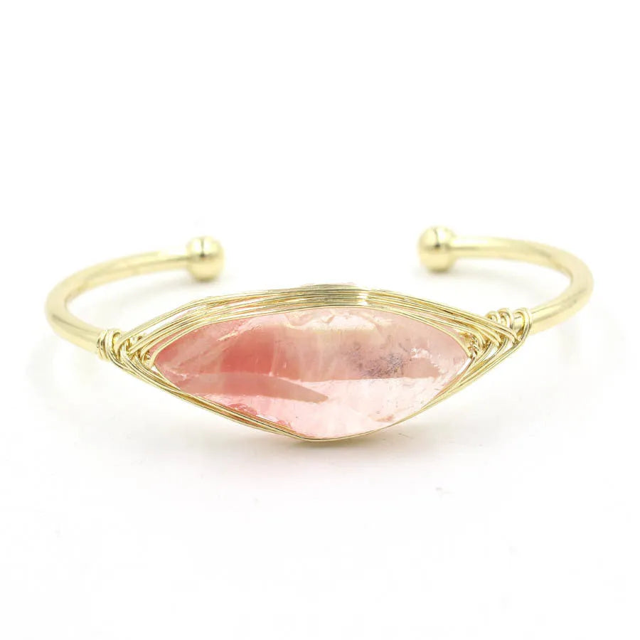 Natural raw gemstone bracelet with 8mm amorphous crystal beads on an adjustable open band.