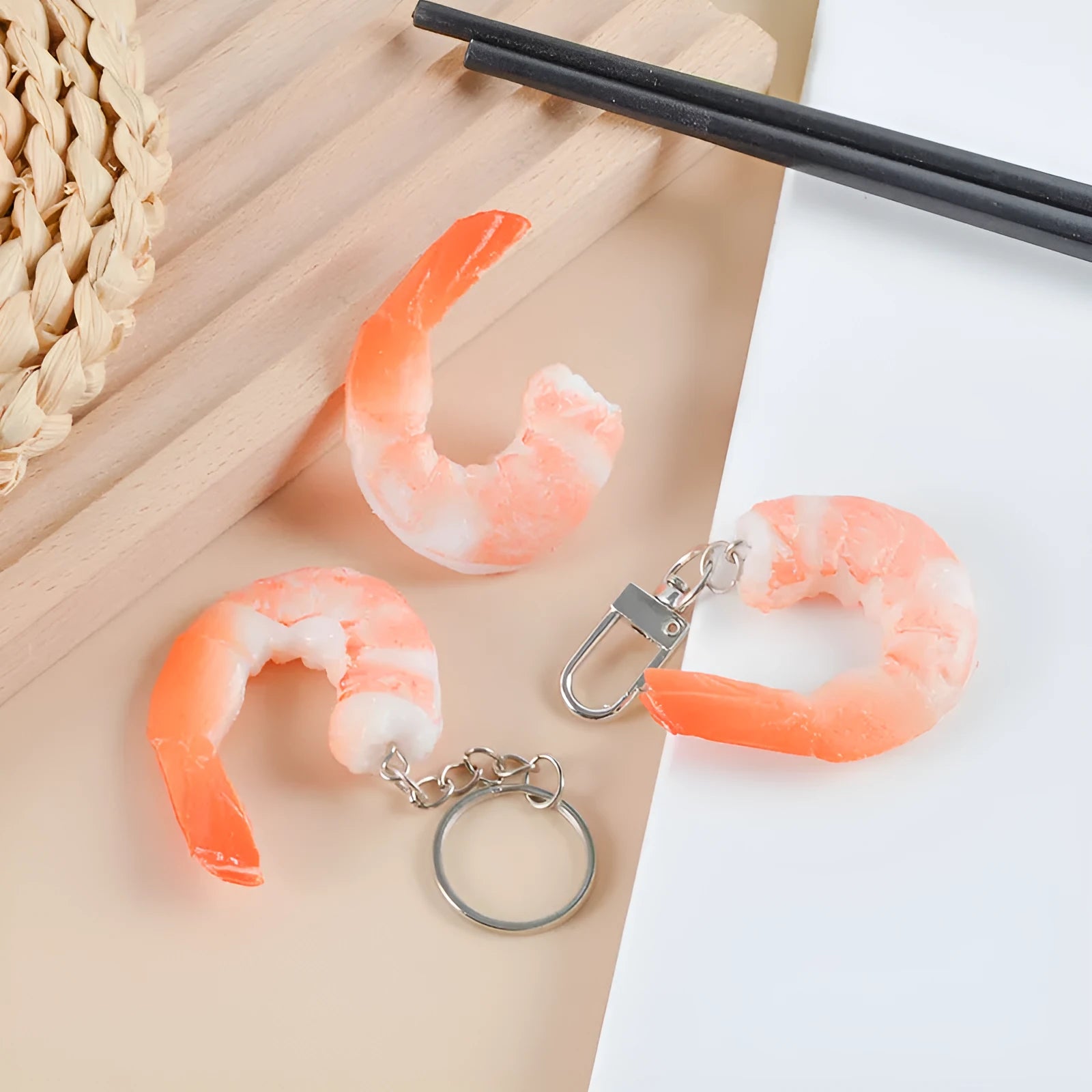 Realistic PVC shrimp-shaped keychain with door buckle attachment, shown against a white background.
