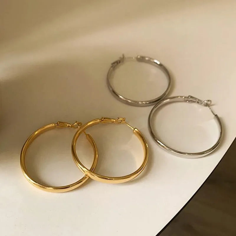 40mm diameter metal circle earrings in gold and silver electroplated finishes