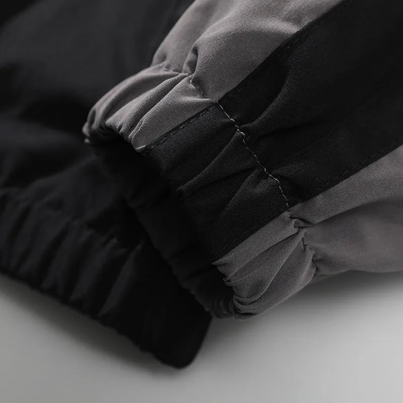 Men's casual jacket with contrast stitching design in black colour showing side seam pockets and regular sleeve length