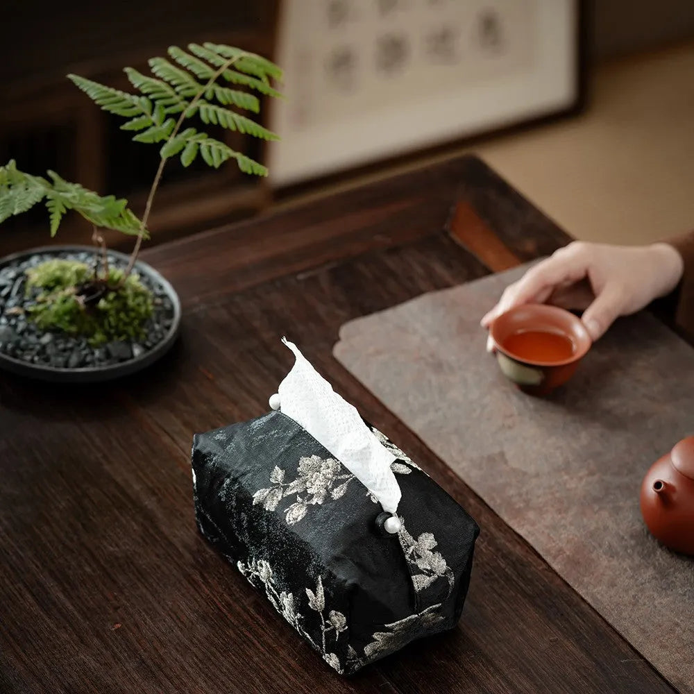 New Chinese brocade style fabric tissue box cover with white plum embroidery pattern.