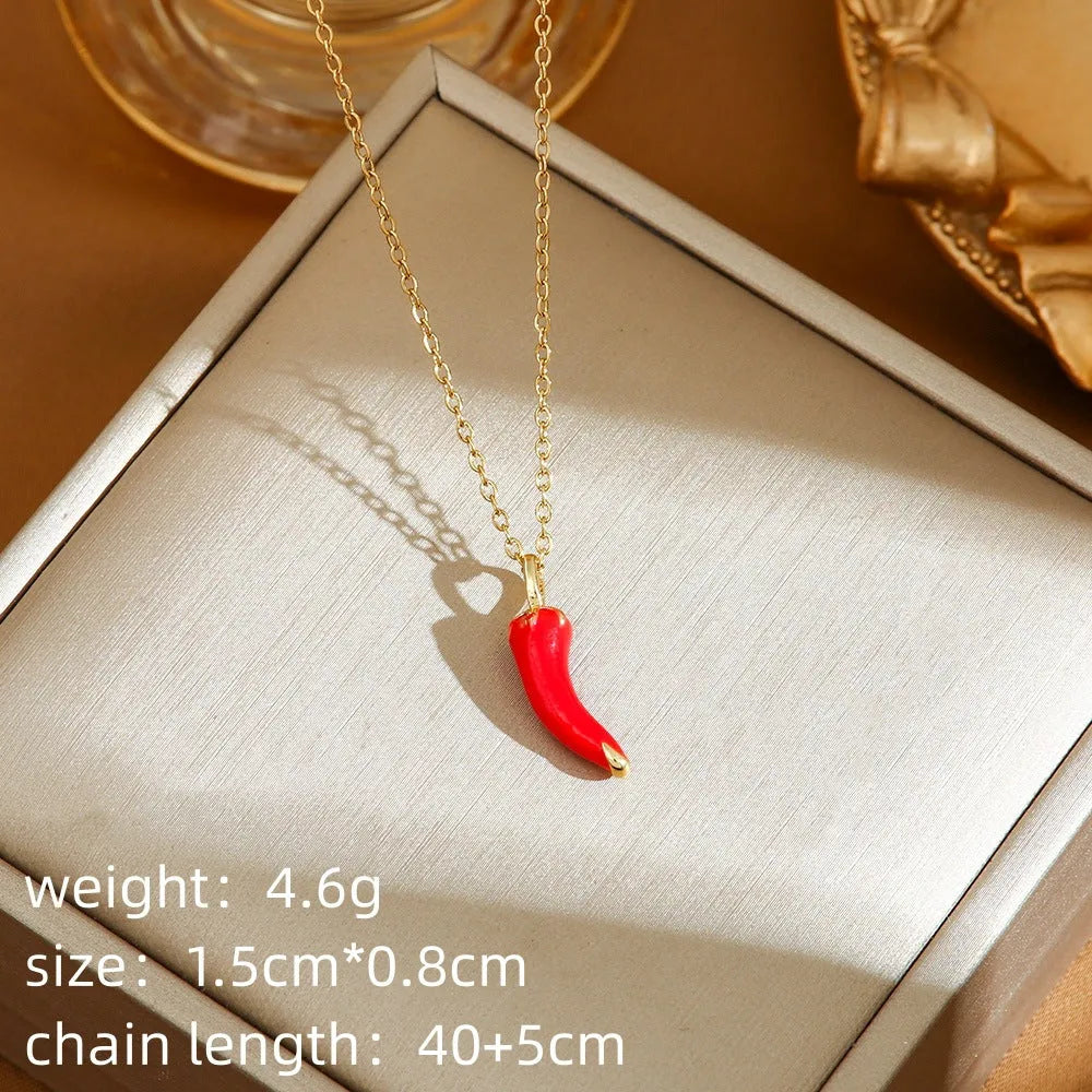 Women's titanium steel necklace with delicate indie pendant designs including strawberry, cherry, and pepper motifs