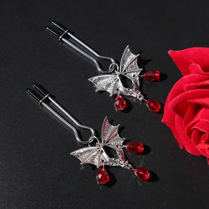 Adjustable silver alloy bat nipple clamp with ruby clip design for BDSM sensory play