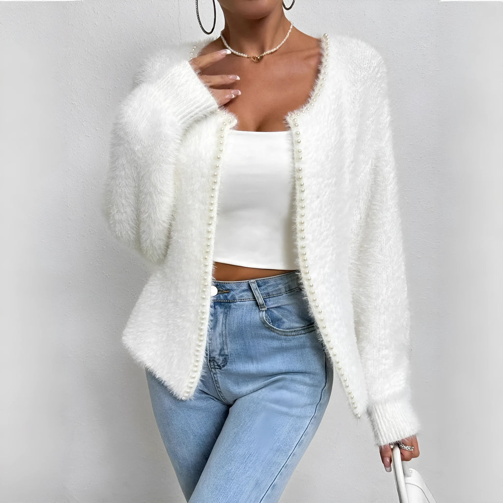 White women's cardigan sweater with V-neck design and beaded knitwork detailing