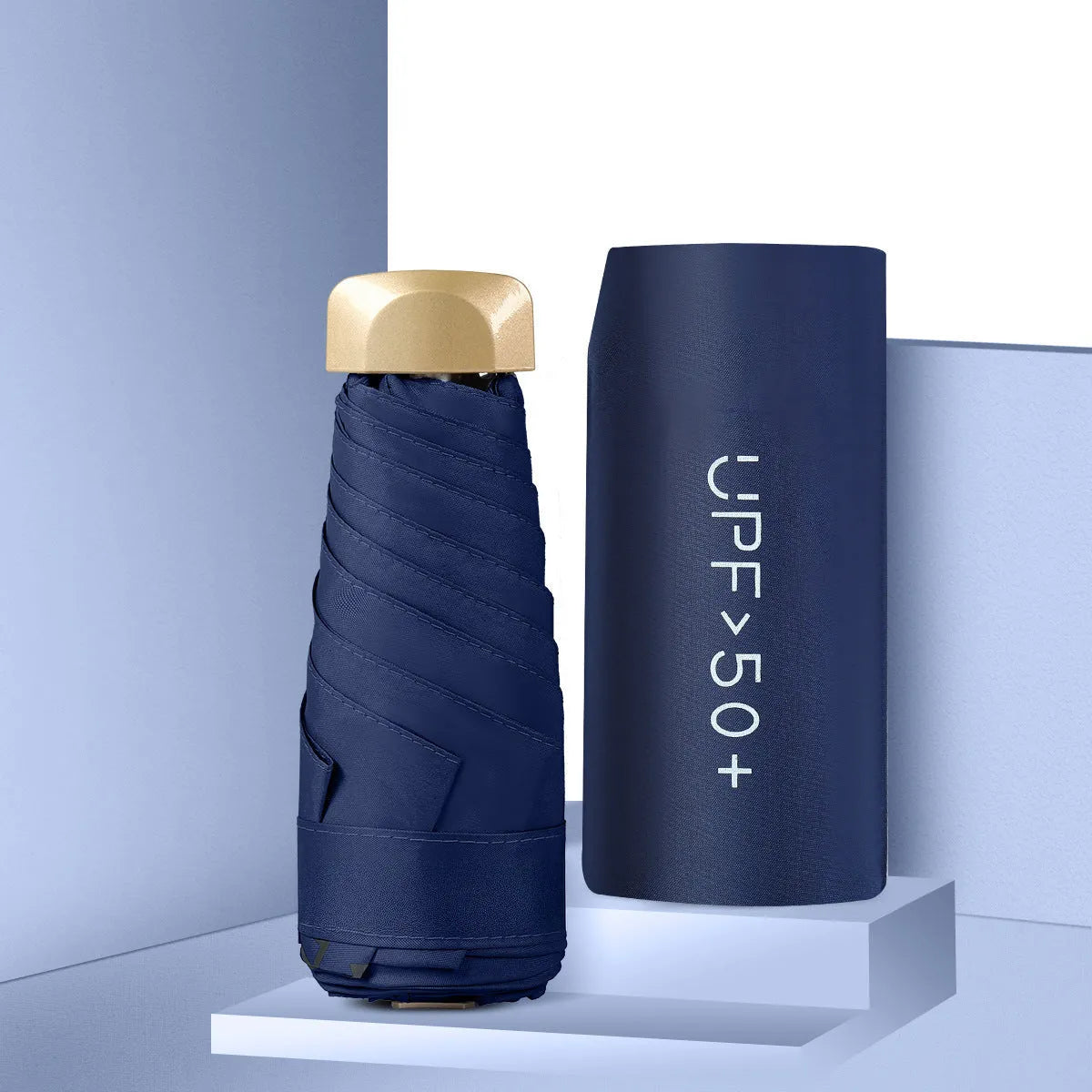 Closed five-fold mini pocket sun umbrella with alloy frame and rubber handle, shown in a selection of available colours.