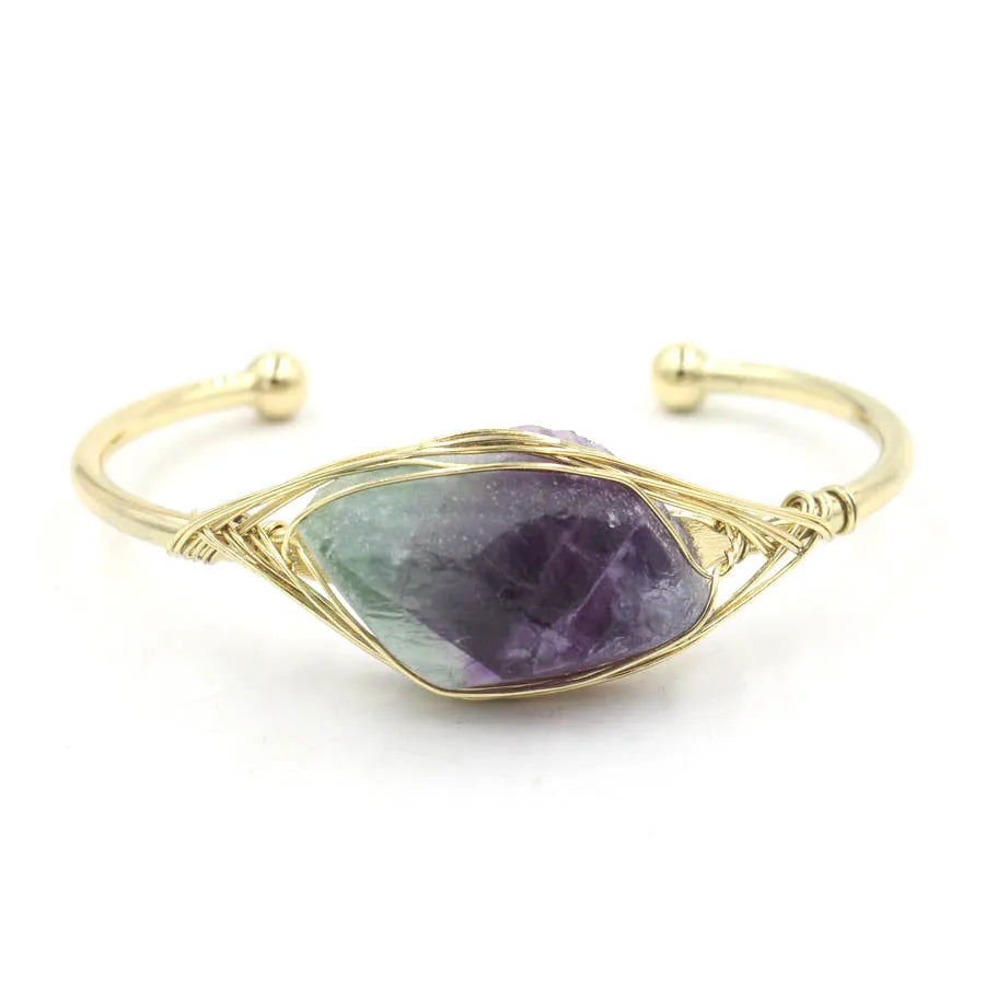 Natural raw gemstone bracelet with 8mm amorphous crystal beads on an adjustable open band.