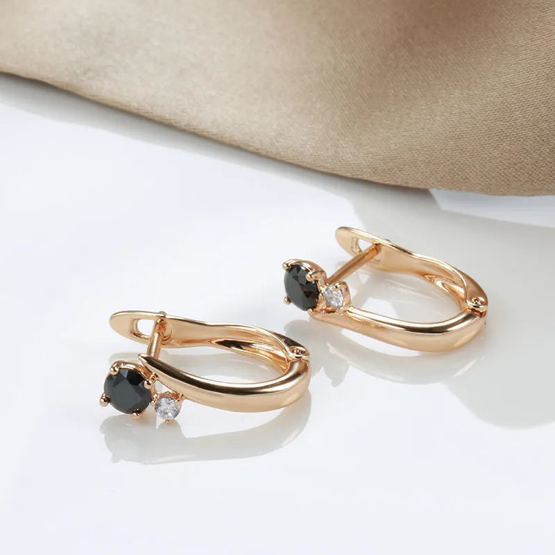 Women's gold geometric black agate drop earrings with retro styling and copper construction
