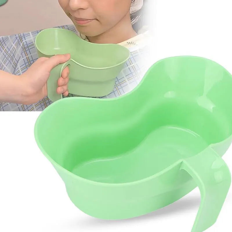 Green plastic nursing gargle cup with angled spout for bedridden patient mouthwash routines