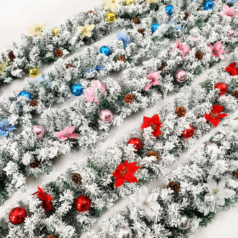 PVC rattan Christmas garland with flocked decoration in golden colour, draped along a mantle