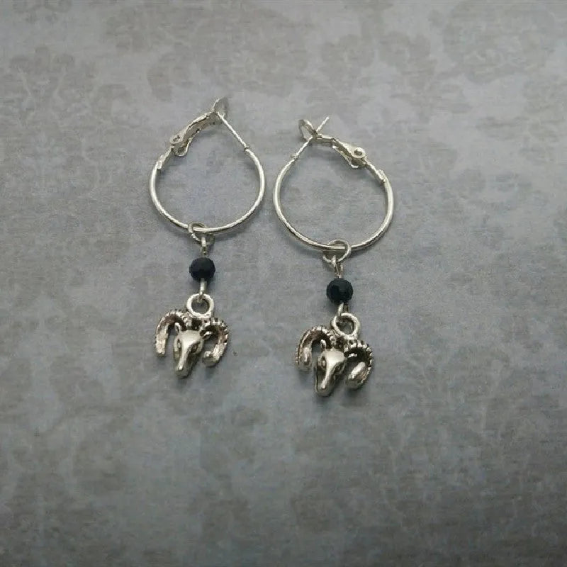 Silver round ring earrings with Tibetan antelope design on circular alloy frames