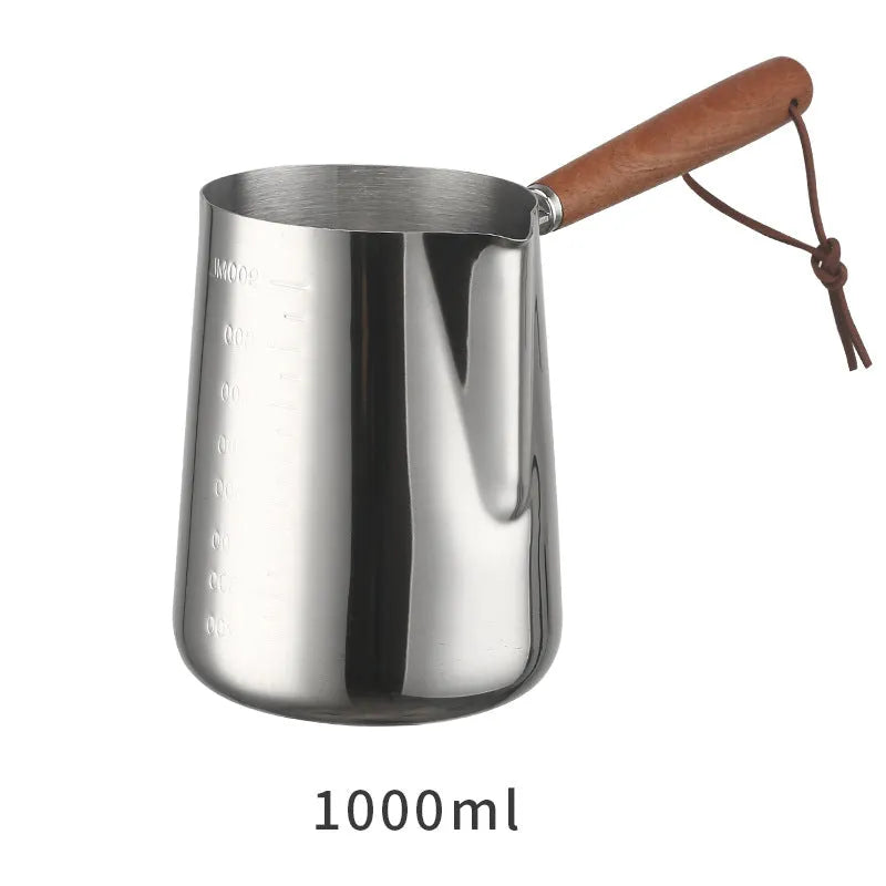 Stainless steel garland coffee cup with a scaled wooden handle shown in a simple, solid colour.