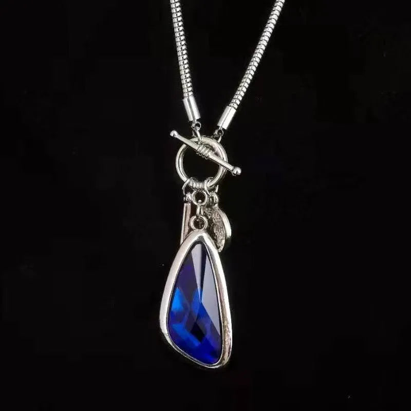 Women's long geometric alloy pendant necklace with snake bones chain in blue colour