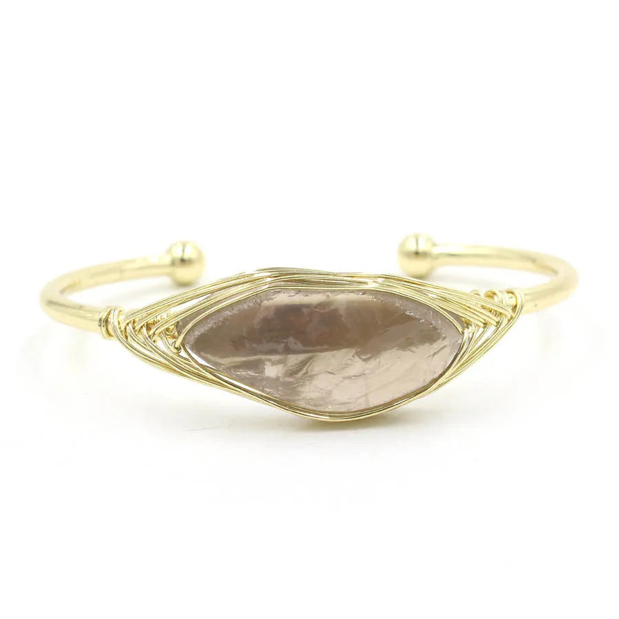 Natural raw gemstone bracelet with 8mm amorphous crystal beads on an adjustable open band.