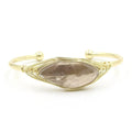 Natural raw gemstone bracelet with 8mm amorphous crystal beads on an adjustable open band.