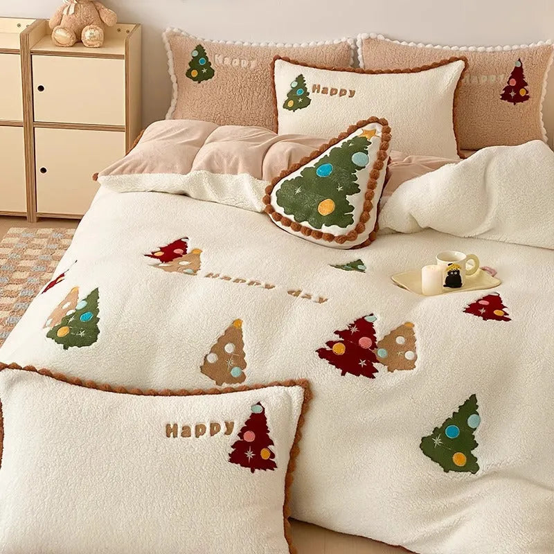 Bright yellow fleece-lined bedding set with embroidered cartoon Christmas tree pattern, including duvet cover, sheet, and pillowcases.