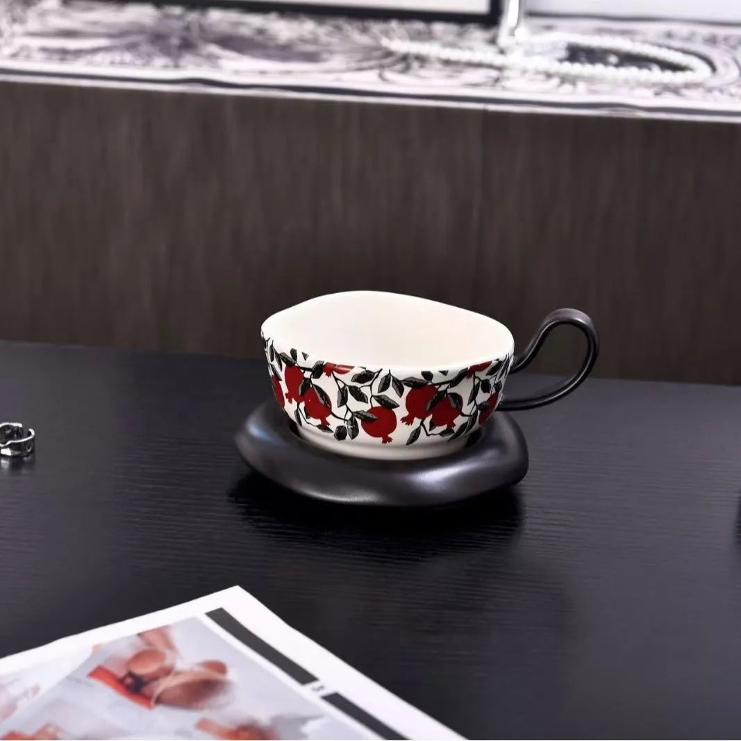 Antique style ceramic coffee cup and saucer set with 210ml capacity in black or orange retro design