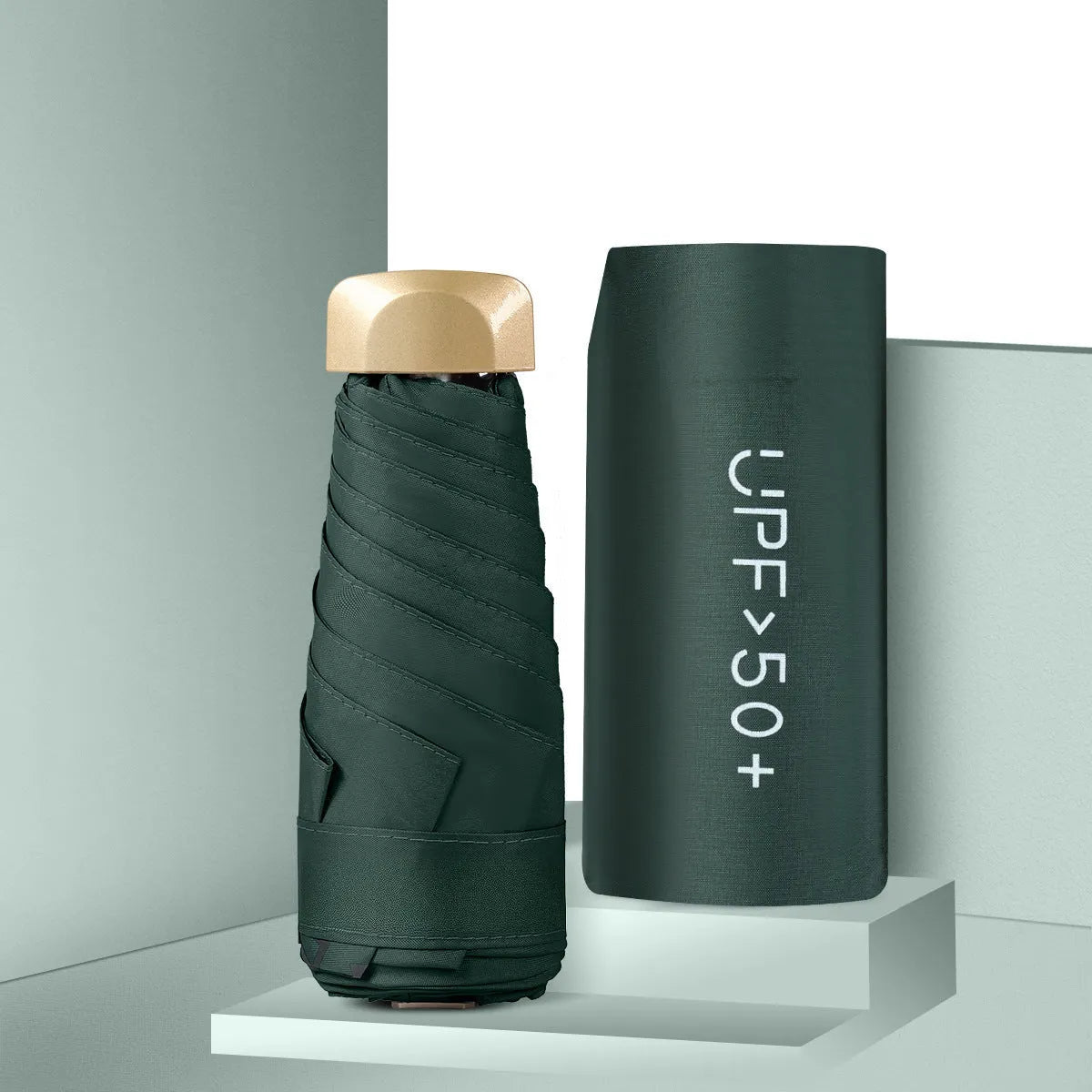 Closed five-fold mini pocket sun umbrella with alloy frame and rubber handle, shown in a selection of available colours.