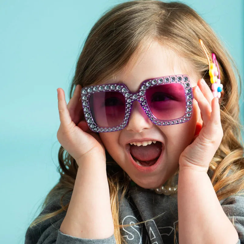 Plastic fashion sunglasses in multiple colour combinations including black frame grey piece and pink mercury options