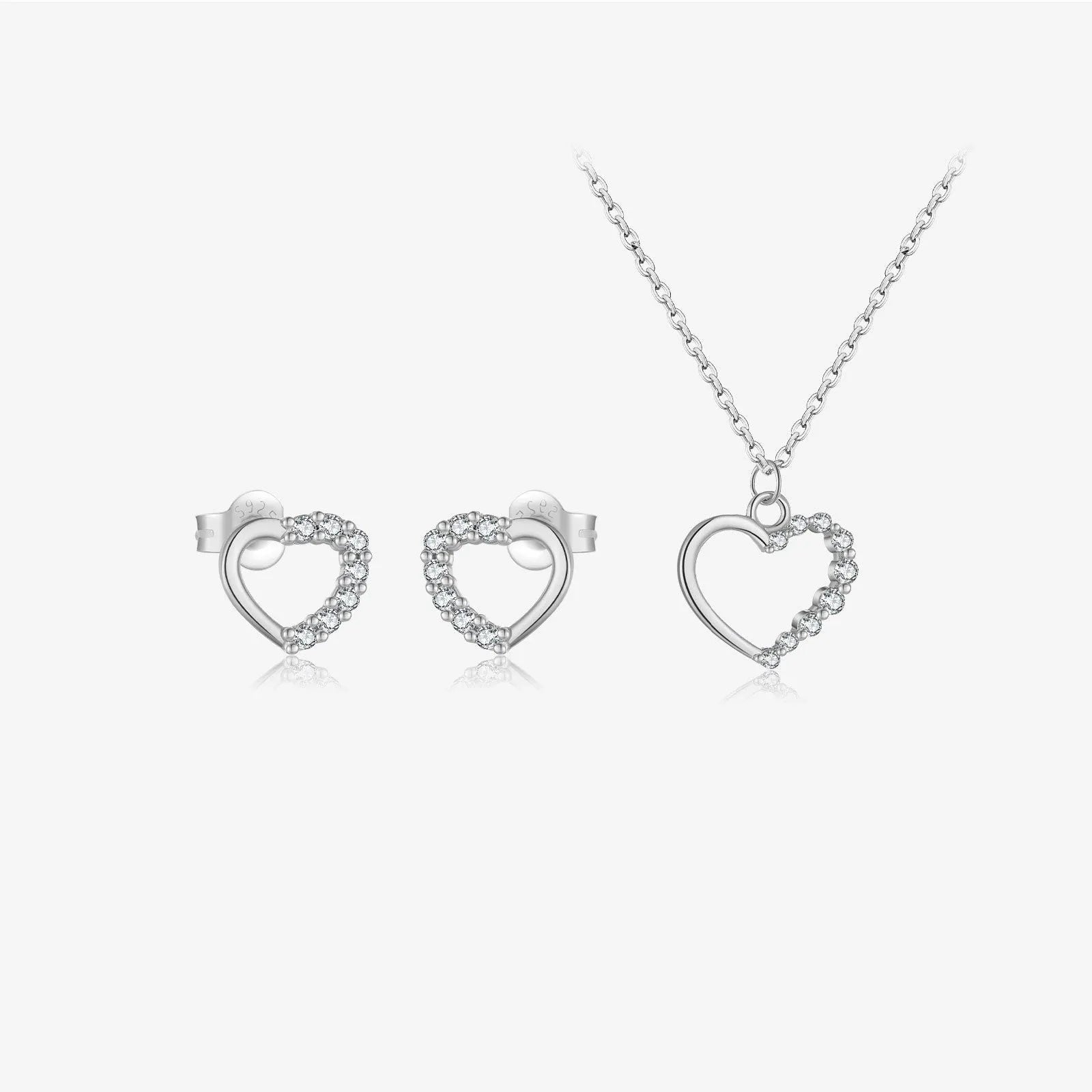 Sterling silver hollow heart necklace with circular details on a regular chain