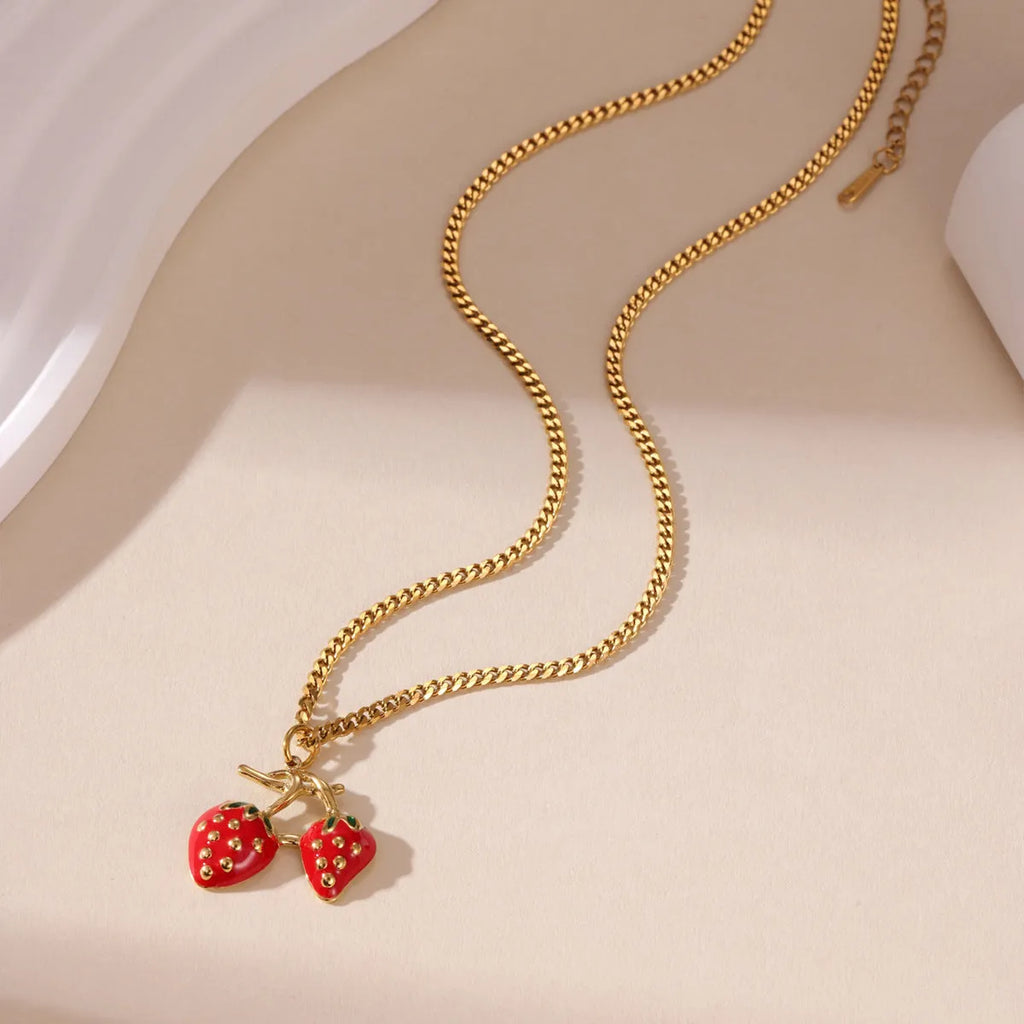 Stainless steel strawberry fruit pendant necklace with white powder gradient finish and red charm